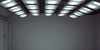 Unlike a lighting box, this is a custom room equipped with ScpectraLight QC lamps. Shown is a dark room with custom lighting on a product.